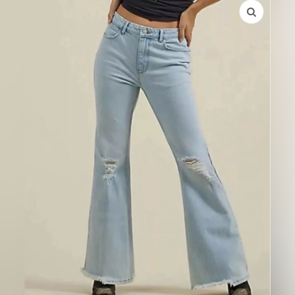 Wrangler Light Blue High Rise Flare Jeans with Distressed Knees